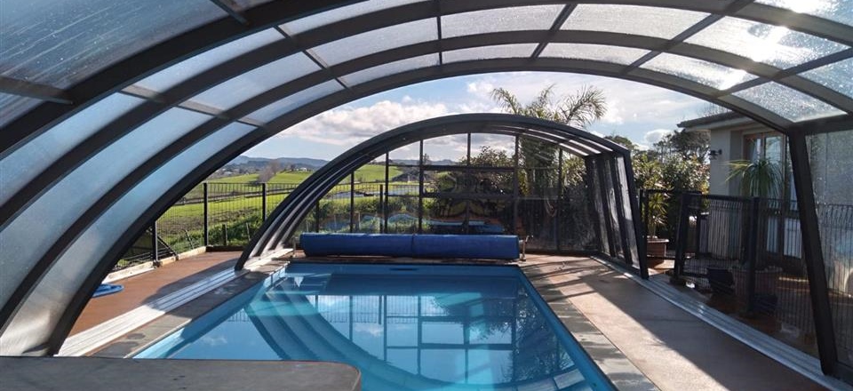 Telescopic Swimming Pool and Spa Enclosures for year round swimming and outdoor living